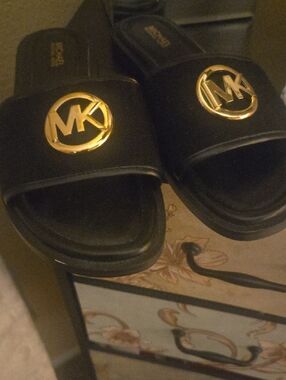 Michael Kors Black Slide Sandals with Gold MK Medallion